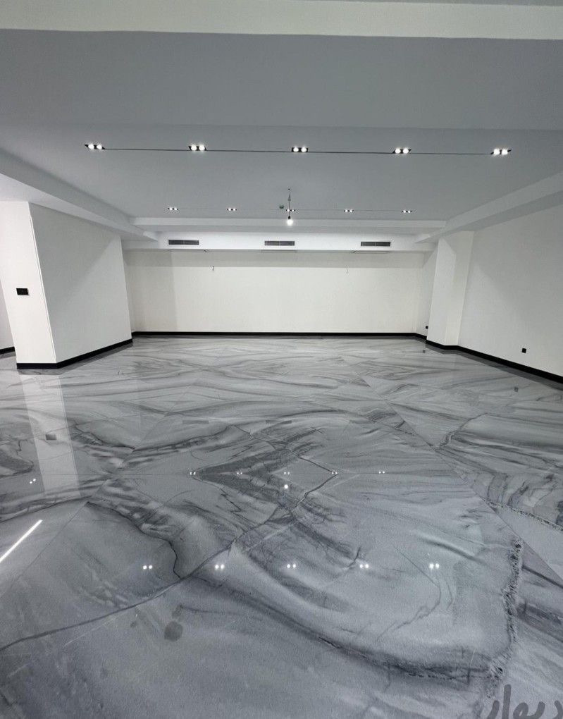 Gray marble metallic epoxy floor in a large interior