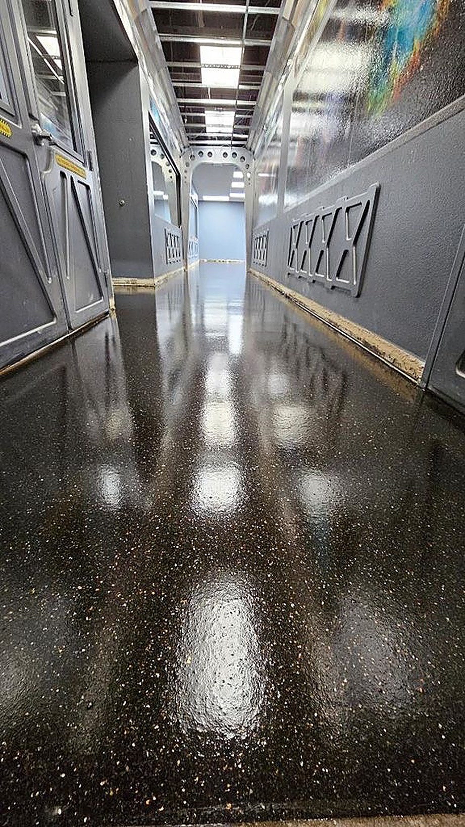 Durable flake epoxy floor in a commercial corridor