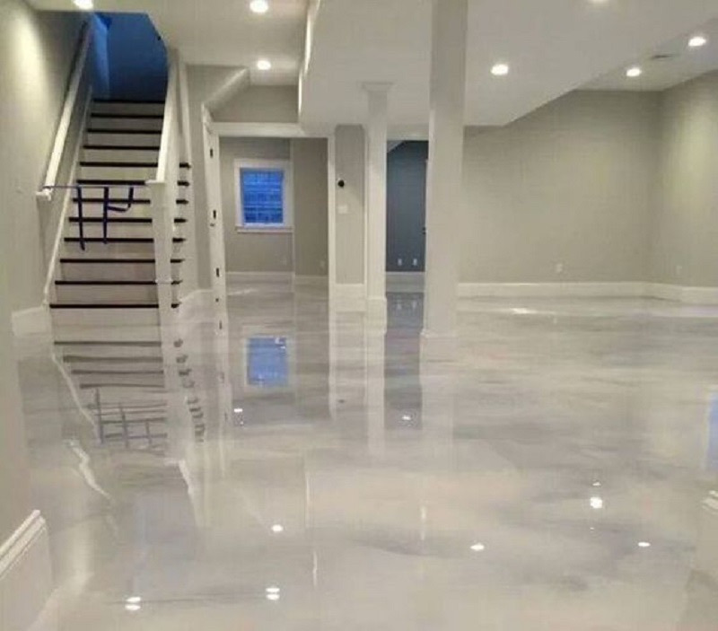 White and silver glossy metallic epoxy floor in an Ivins Utah home
