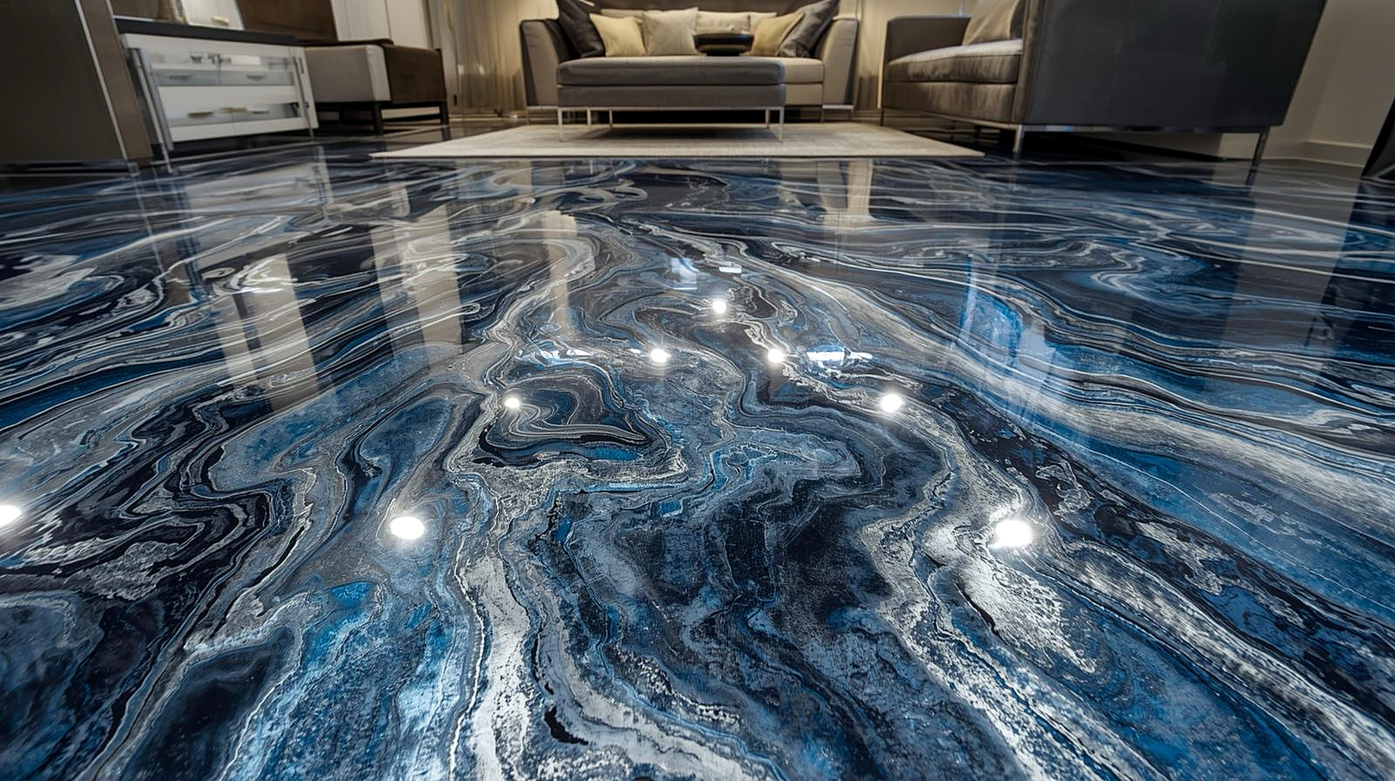 Dramatic blue metallic epoxy floor in a living room