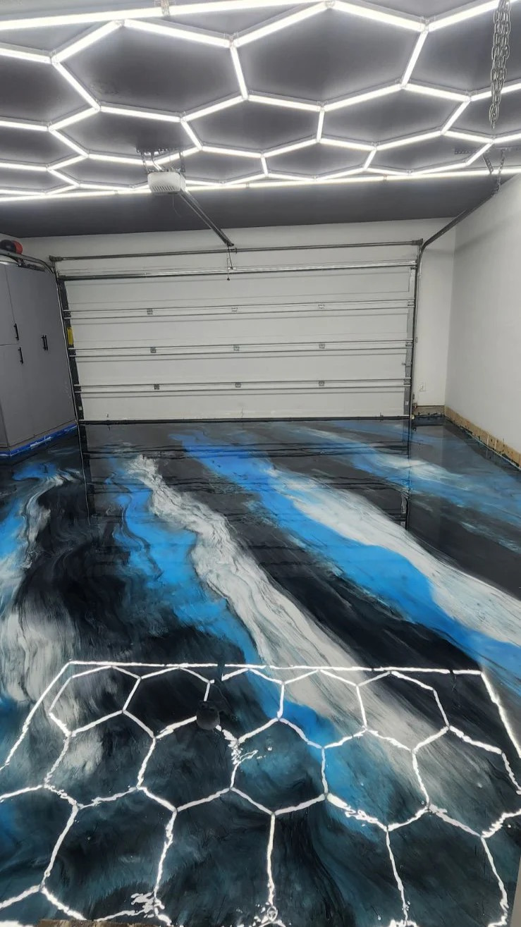 Blue black and silver metallic garage floor with glass door